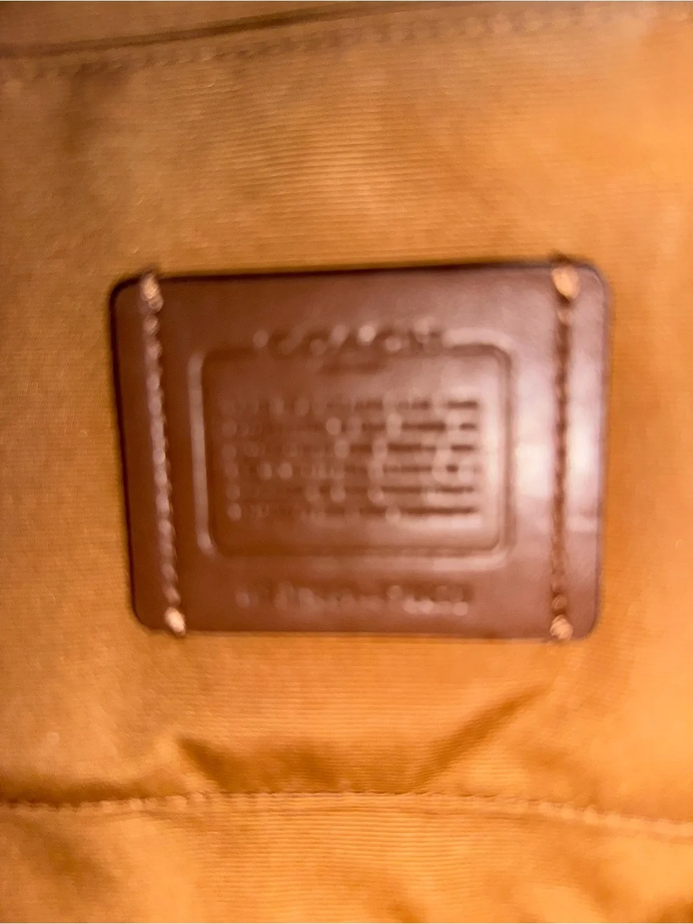 Coach Pebbled Leather Toiletry Pouch in Tan